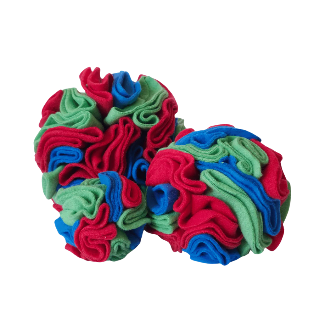 Small, medium and large snuffle balls in colour way Highland - blue, green and red. Enrichment toy for pets handmade in New Zealand.