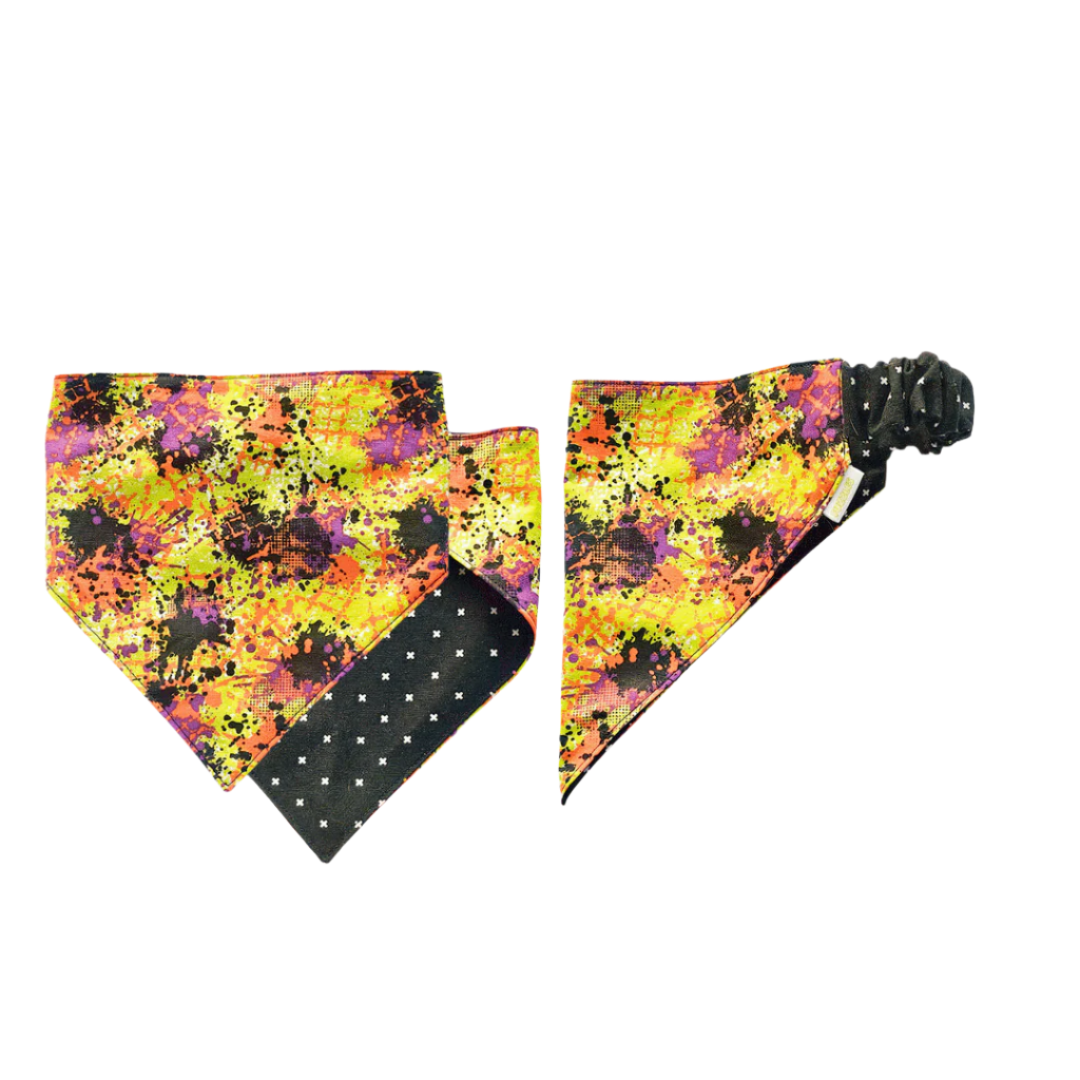 Black, orange, green splatter/Black with white cross reversible scrunchie pet bandana – slips over the head, handmade in New Zealand.