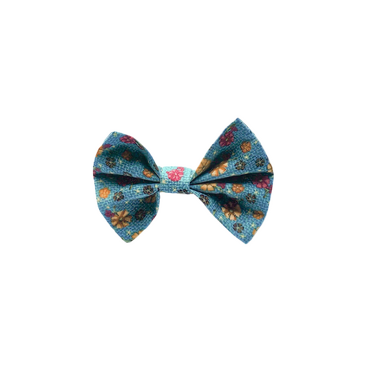 Blue retro floral bow tie for pets – fits over collar with elastic, handmade in New Zealand.